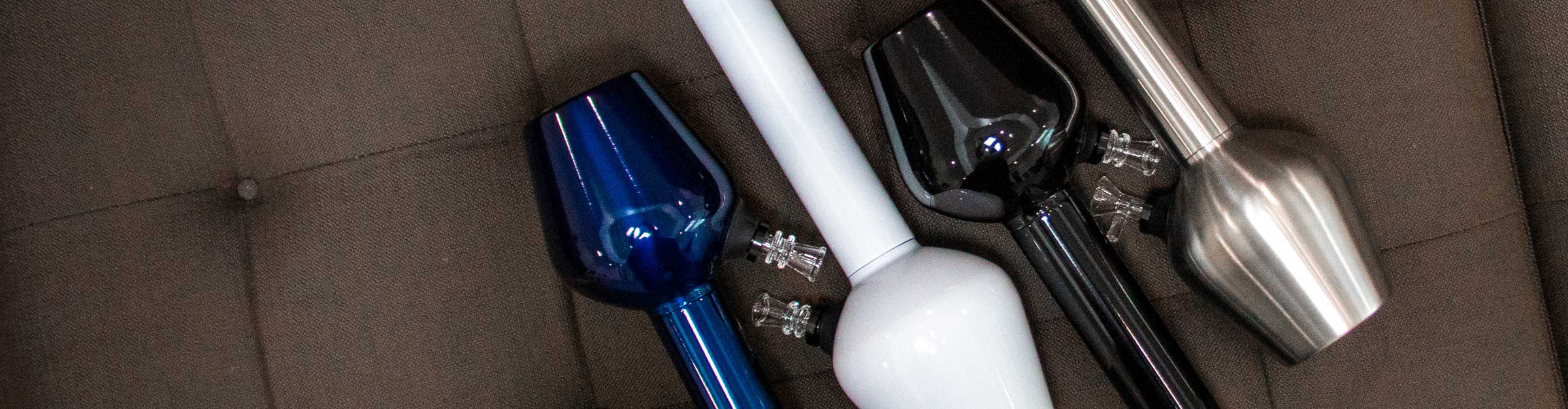 Chill Water Pipes laying down on couch inside office building.