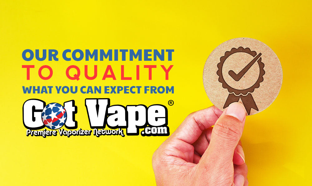 man holding a sticker of a ribbon with a check mark against a yellow wall with text