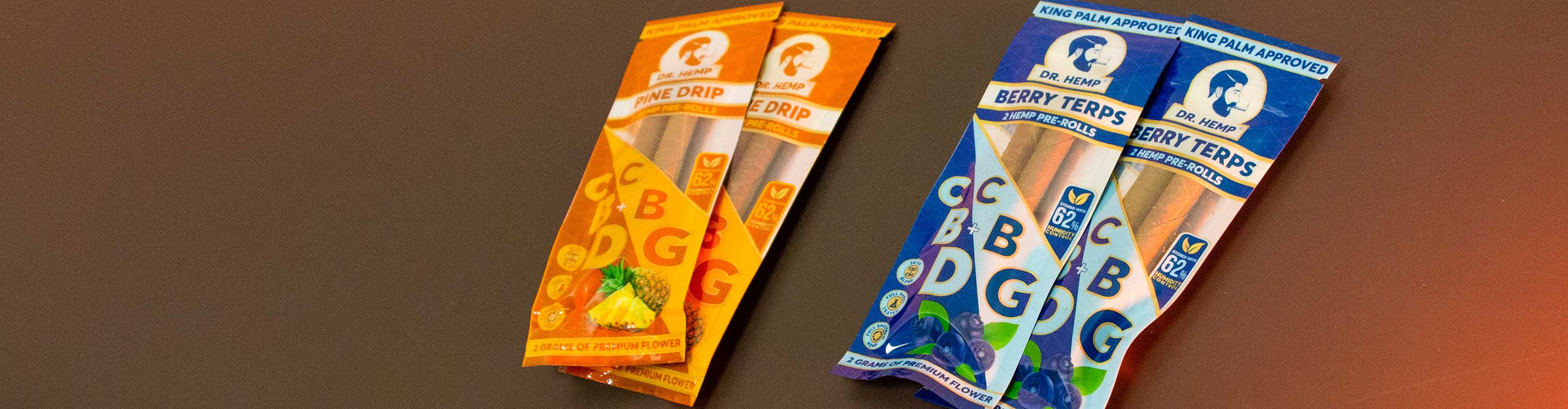 King Palm Dr. Hemp CBD CBG Wraps laying down on black office desk with yellow lighting.