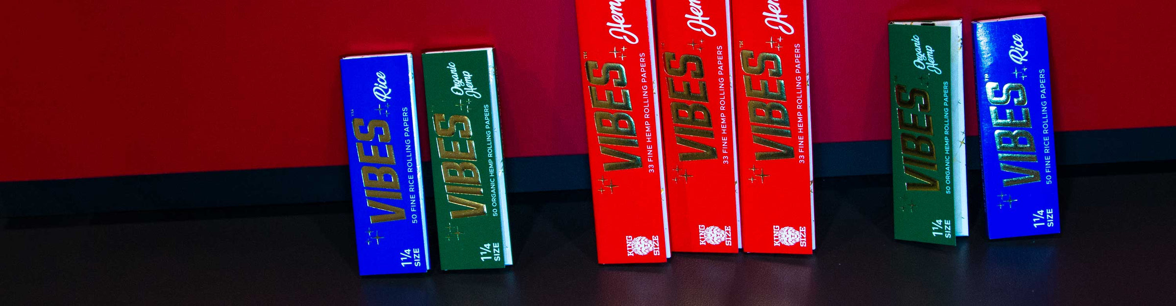 Got Vape Retail Rolling Accessories standing against table with red background.