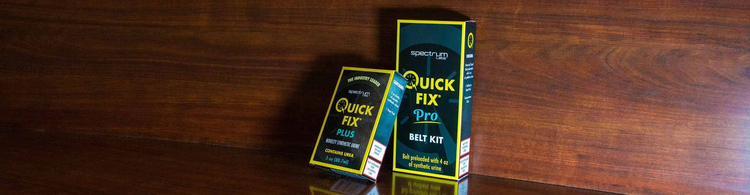 Spectrum Lab Products laying against wooden table inside office