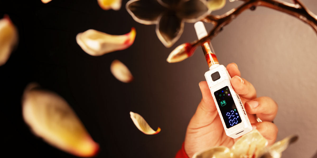 Hand holding Wulf Grid near plants